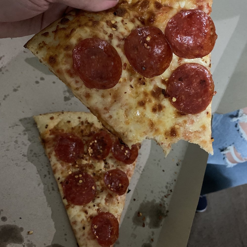 a slice of pepperoni pizza a slice of pepperoni pizza