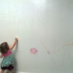Marie Callen, DMD - Drawing on the giant dry erase wall while we get comfortable!
