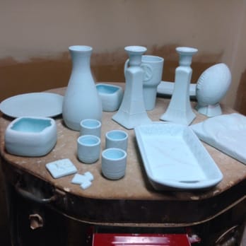 Sunfire Ceramics - Dipped painted pieces before being placed in the kiln.  the glaze turns clear in the kiln! - Venues & Event Spaces Near Me - Lawrence, Kansas