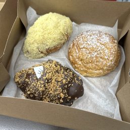 Top Left: Salted Butter Bread with Castillo? Top Right: Custard Bun Bottom: Dirty Chocolate Crumble Croissant