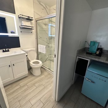 Hotel Zazz - Retro fridge (with freezer), Keurig, bathroom with a very cool mirror and shower with rain style shower head - Hotels Near Me - Albuquerque, New Mexico