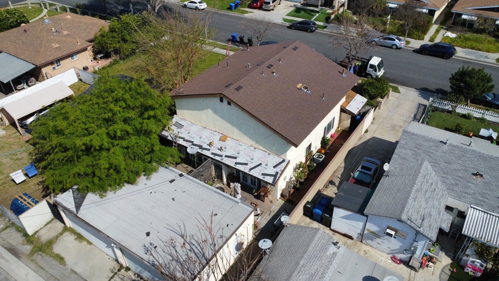 Slide of Ruiz Roofing