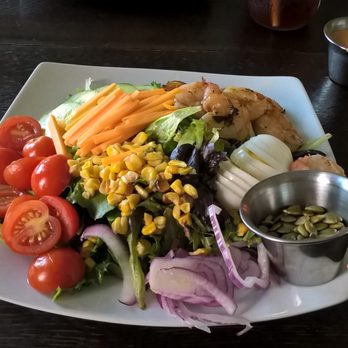 Cast Iron Kitchen - Farmers Cobb Salad with grilled shrimp (pumpkin seeds & tomatoe vinaigrette - Southern Near Me - Wilmington, North Carolina Cast Iron Kitchen - Farmers Cobb Salad with grilled shrimp (pumpkin seeds & tomatoe vinaigrette - Southern Near Me - Wilmington, North Carolina