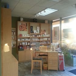 Merle Norman Cosmetic Studio & Day Spa - One of the consultation tables at the spa.  Stop in for a complimentary makeover.