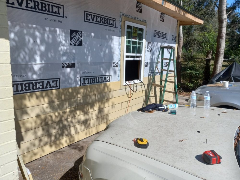 Slide of DJ'S Construction Roofing Siding & Framing