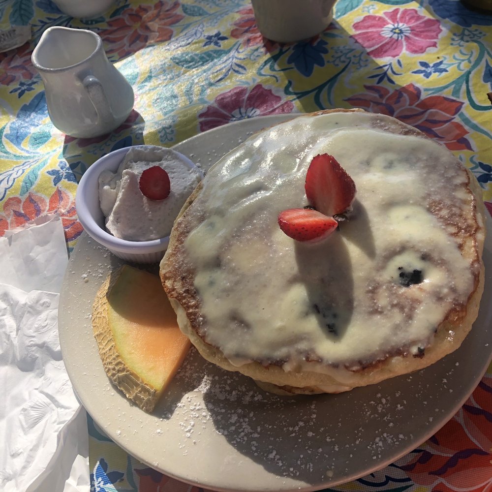 The Breakfast Cottage - Blackberry pancakes with lemon glaze. - Breakfast & Brunch Near Me - Nokomis, Florida The Breakfast Cottage - Blackberry pancakes with lemon glaze. - Breakfast & Brunch Near Me - Nokomis, Florida