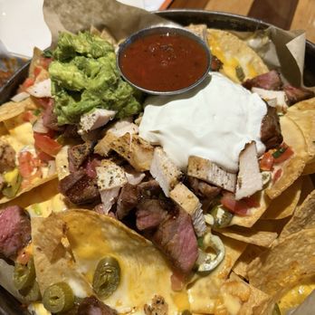 BJ's Restaurant & Brewhouse - Deep Dish Nachos - Pizza Near Me - Folsom, California BJ's Restaurant & Brewhouse - Deep Dish Nachos - Pizza Near Me - Folsom, California