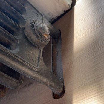 Kunkle’s Construction - Cutting around radiators - Flooring Near Me Kunkle’s Construction - Cutting around radiators - Flooring Near Me