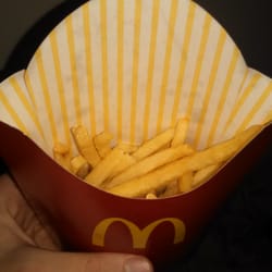 McDonald's - Two of the LARGE fries were like this out of bag.