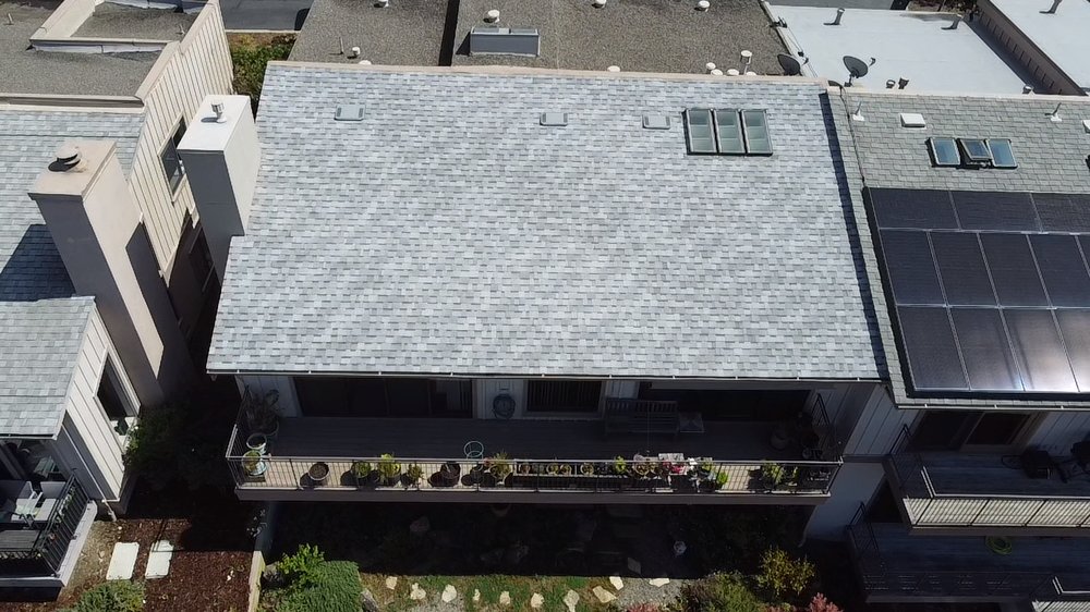 Slide of Equinox Roofing