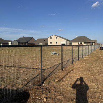 Cattlemen Fencing - 5ft tall pipe fence with no climb wire in Rhome, TX. - Fences & Gates Near Me - Justin, Texas Cattlemen Fencing - 5ft tall pipe fence with no climb wire in Rhome, TX. - Fences & Gates Near Me - Justin, Texas