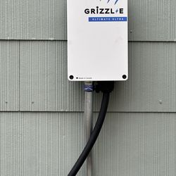 Lighthouse Home Electrical Services - Ev charger installed on side of house