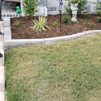 Top Tier Custom Landscape - a lawn with a flower bed - Landscaping Near Me Top Tier Custom Landscape - a lawn with a flower bed - Landscaping Near Me
