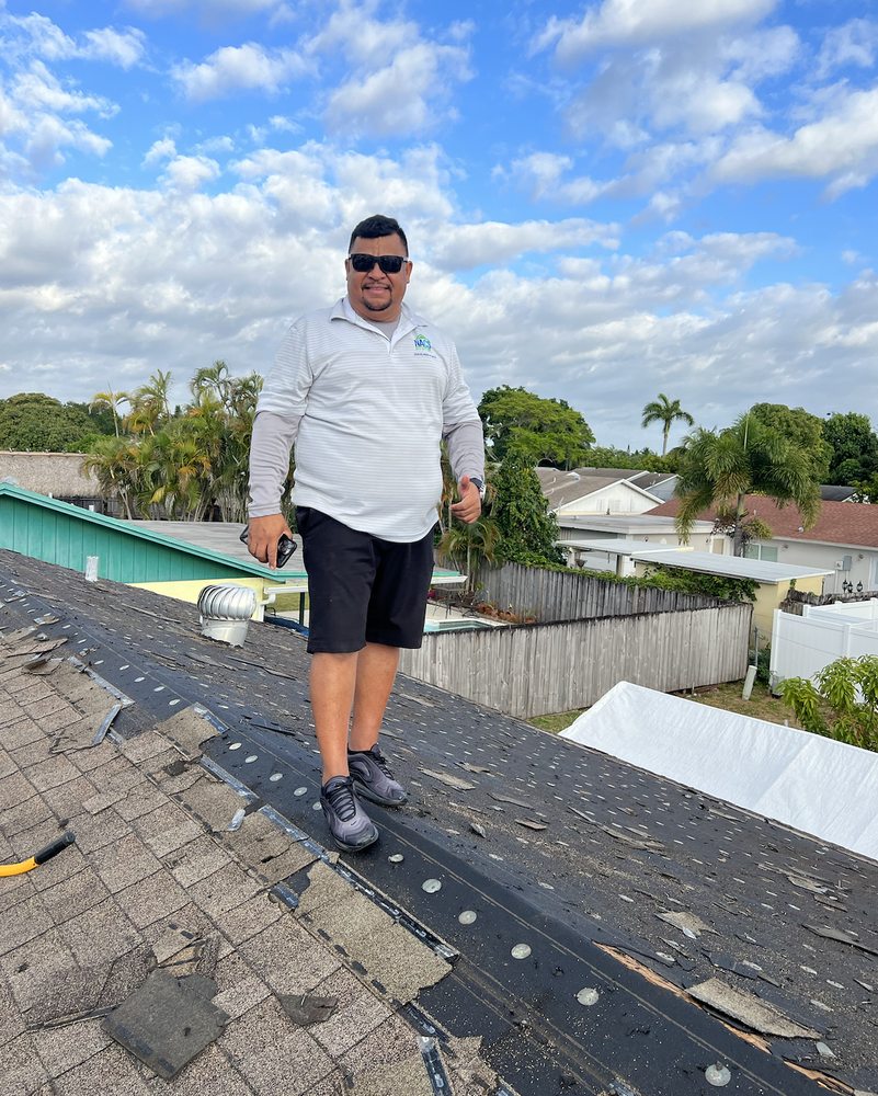 Slide of Nacs Roofing