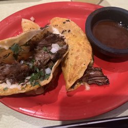 Tipsy Taco - Tender beef, onions and cilantro. SO good!