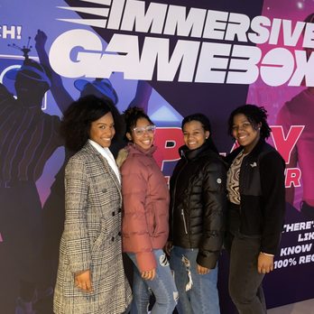 Immersive Gamebox - Picture in front of the sign. - Virtual Reality Centers Near Me - New York, New York