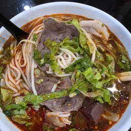 Spicy noodles with sliced pork, beef,meatballs, sliced chicken roll. Vietnamese bun bo hue. Spicy noodles with sliced pork, beef,meatballs, sliced chicken roll. Vietnamese bun bo hue.