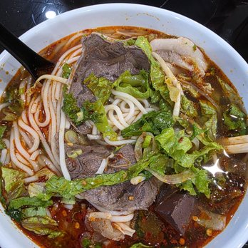 Paris Banh Mi- Davie - Spicy noodles with sliced pork, beef,meatballs, sliced chicken roll. Vietnamese bun bo hue. - Sandwiches Near Me - Davie, Florida Paris Banh Mi- Davie - Spicy noodles with sliced pork, beef,meatballs, sliced chicken roll. Vietnamese bun bo hue. - Sandwiches Near Me - Davie, Florida