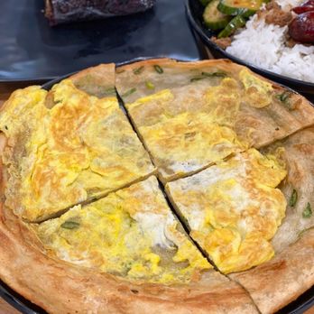 Yi Mei - Green Onion Pancake (蔥油餅) - $5 + $1.25 for egg - Taiwanese Near Me - San Gabriel, California Yi Mei - Green Onion Pancake (蔥油餅) - $5 + $1.25 for egg - Taiwanese Near Me - San Gabriel, California