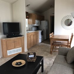 Boomtown USA RV Resort - This is the San Antonio cabin that is fully furnished and available for rent. It sits right on the lake.