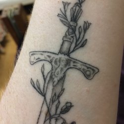 Heroic Ink Tattoo and Piercing - Sword tattoo closeup