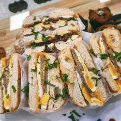 Toasted Bagelry & Deli - Bacon, sausage egg and cheese served on a bagels