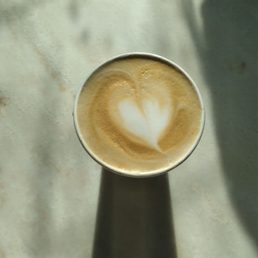 A small caramel latte A small caramel latte