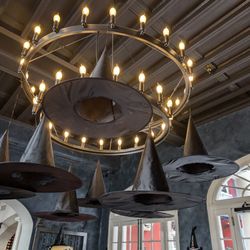 Destination Kitchen - Brennen family decor for Halloween. That's one way to dress up a chandelier!
