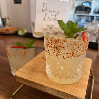 Saku - a cocktail with a mint leaf garnish - Cocktail Bars Near Me - Hoboken, New Jersey Saku - a cocktail with a mint leaf garnish - Cocktail Bars Near Me - Hoboken, New Jersey