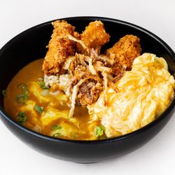 Basic Curry Chicken with scrambled egg and cheese added.