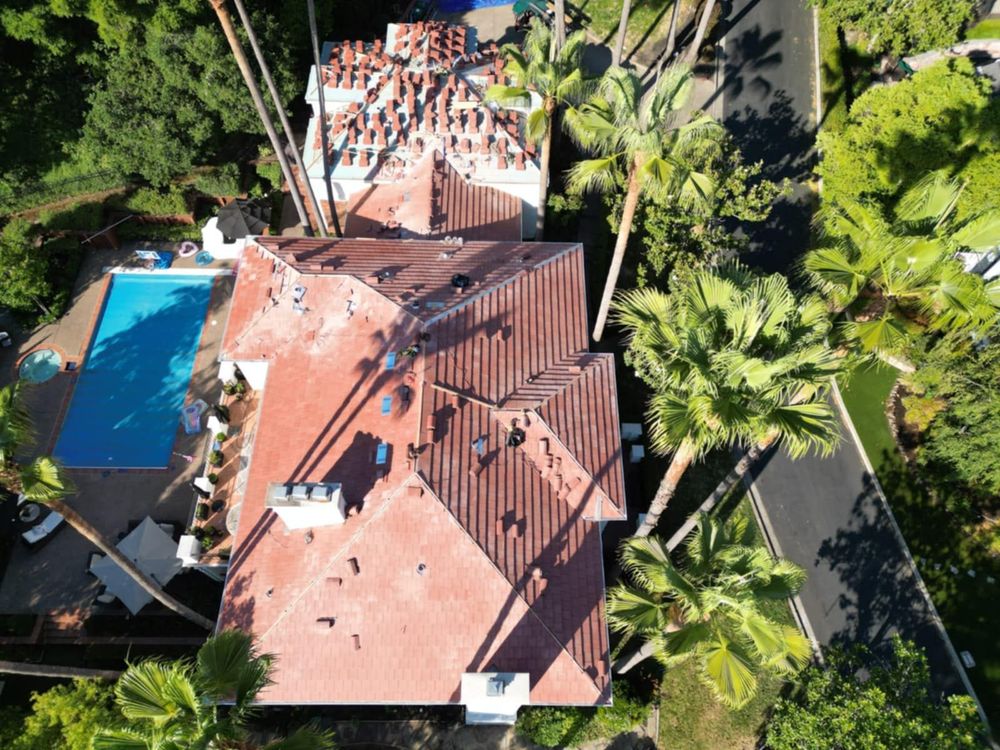 Slide of RR Alvarez Roofing