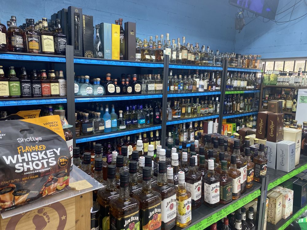 Tipsy’s Wine & Spirits Logo
