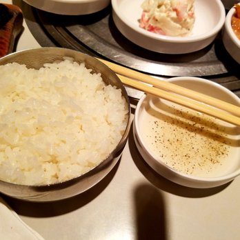 Yakiniku Seoul - Rice in the metal Korean bowls and the sesame oil/salt/pepper dipping sauce for the meat - Korean Near Me - Honolulu, Hawaii Yakiniku Seoul - Rice in the metal Korean bowls and the sesame oil/salt/pepper dipping sauce for the meat - Korean Near Me - Honolulu, Hawaii