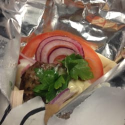 Kefi Souvlaki & Pizza Bar - Tucking into my fresh, delicious lamb souvlaki on the train home.