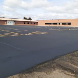 John Jennings Blacktop Sealcoating - Parking lot sealcoating and striping
