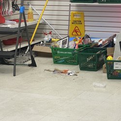 Dollar Tree - One employee just swept all of this next to the "return" items in those baskets on the floor.