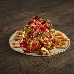 Taco Bamba City Ridge - taco with sweet chili glazed crispy chicken, kimchi, soy pickle salad, slaw, flour tortilla