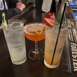 hree cocktails on a bar