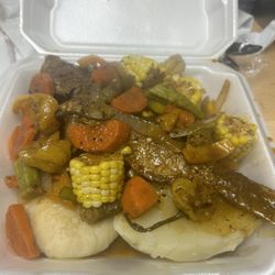 Island Flavaz - Brown stew Fish with boil dumplings and banana