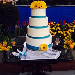 My daughter's simple wedding cake, it was fruit filled vanilla, buttercream. Excellent taste, moist and delicious
