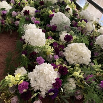 Fifty Flowers - Our FiftyFlowers after we made them into centerpieces - large white hydranges, yellow snap dragons, lavender roses, purple lisanthium - Floral Designers Near Me Fifty Flowers - Our FiftyFlowers after we made them into centerpieces - large white hydranges, yellow snap dragons, lavender roses, purple lisanthium - Floral Designers Near Me
