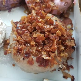 Duck Donuts - Glazed donut with bacon topping and maple icing. - Donuts Near Me - Greenville, South Carolina Duck Donuts - Glazed donut with bacon topping and maple icing. - Donuts Near Me - Greenville, South Carolina