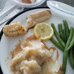 Tried to bite that hard fish... Fake looking string beans and I attempted to season them potatoes lol