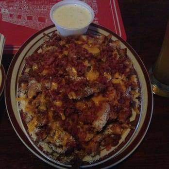 The Silo Restaurant - Sidewalk fries $6.60 Sliced up baked potato deep fried - Pizza Near Me - Lake Bluff, Illinois