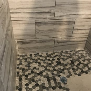 Sowell Enterprises - a tiled shower with hexagon tiles - General Contractors Near Me - Panama City Beach, Florida Sowell Enterprises - a tiled shower with hexagon tiles - General Contractors Near Me - Panama City Beach, Florida