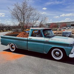 Customer's cute little blue truck loaded with bark!
