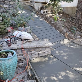 MTS Landscape - Ramp where stairs used to be, with a good traction finish. No more shoveling snow on stairs for me!! Drive the snowblower down!! - Masonry/Concrete Near Me - Moreno Valley, California