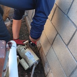 Backyard Pool & Spa Repair - Zahan disassembling the pump motor.