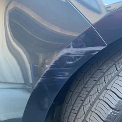 Cosmetic Auto Repair Inc - This nasty scrape was repaired to look like new.