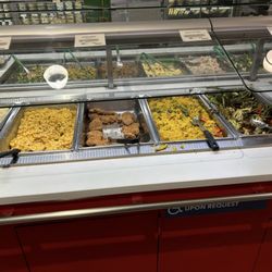Whole Foods Market - That's the hot bar not much to it today I guess they called himself chef for some reason, but it ain't for cooking this stuff